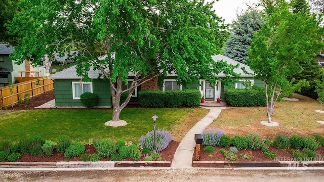 3102 N Sycamore Dr, Boise, ID 83703 - obstructed view of property featuring roof with shingles