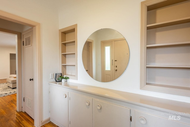 3102 N Sycamore Dr, Boise, ID 83703 - bathroom featuring built in features and wood finished floors