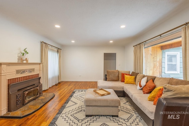 3102 N Sycamore Dr, Boise, ID 83703 - living area featuring recessed lighting, wood finished floors, and baseboards