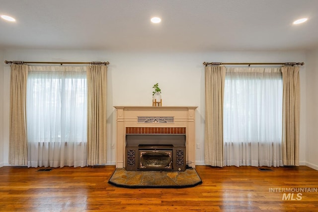 3102 N Sycamore Dr, Boise, ID 83703 - living area featuring wood finished floors, plenty of natural light, recessed lighting, and baseboards