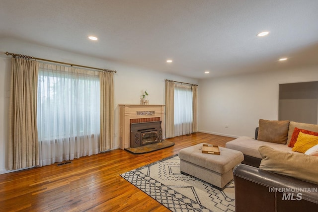 3102 N Sycamore Dr, Boise, ID 83703 - living area featuring wood finished floors, recessed lighting, and baseboards