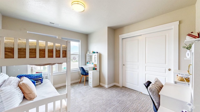 161 S Baraya Way, Meridian, ID 83642 - bedroom with light carpet, a closet, an office area, and baseboards