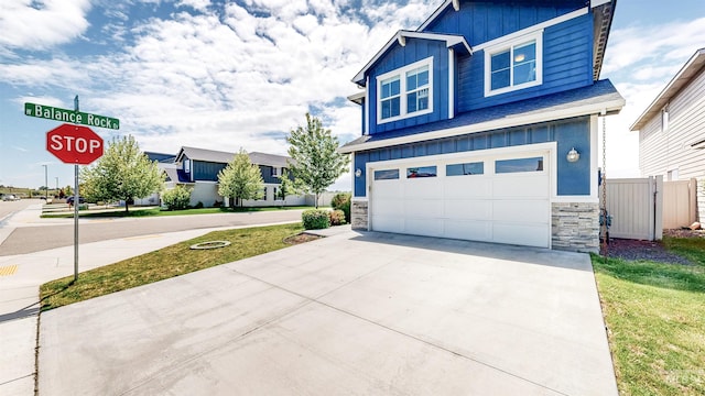 161 S Baraya Way, Meridian, ID 83642 - craftsman-style home featuring board and batten siding, stone siding, concrete driveway, and a garage