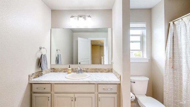 161 S Baraya Way, Meridian, ID 83642 - bathroom with vanity, toilet, and curtained shower