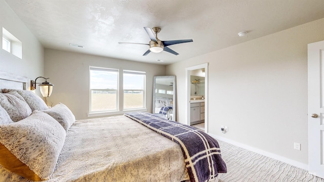 161 S Baraya Way, Meridian, ID 83642 - bedroom with carpet flooring, baseboards, a ceiling fan, and ensuite bath
