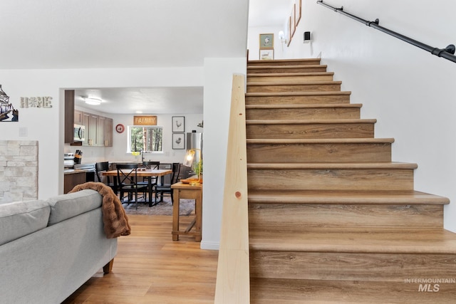 16 Grouse Rd, Idaho City, ID 83631 - staircase featuring wood finished floors