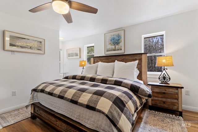 16 Grouse Rd, Idaho City, ID 83631 - bedroom featuring baseboards, ceiling fan, and wood finished floors