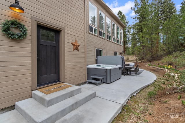 16 Grouse Rd, Idaho City, ID 83631 - property entrance with a hot tub and a patio area