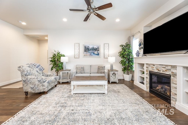 living area with recessed lighting, wood finished floors, a ceiling fan, and baseboards
