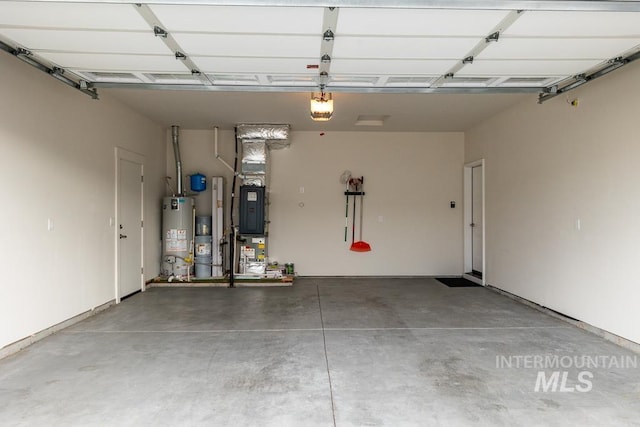 garage with a garage door opener and gas water heater