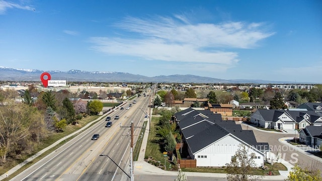 drone / aerial view with a mountain view and a residential view