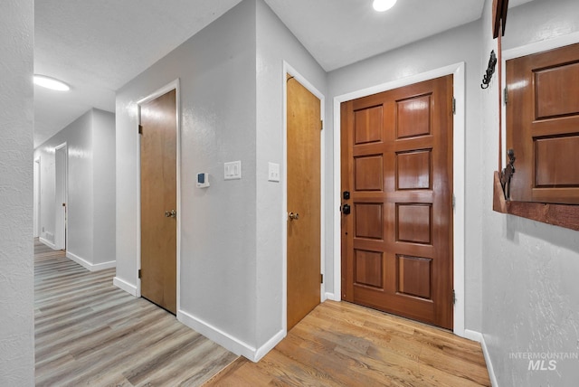 entryway featuring light hardwood / wood-style floors