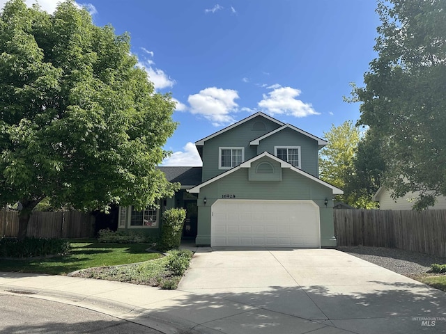 16928 N Chelford Loop, Nampa, ID 83687 - traditional-style home featuring driveway and an attached garage