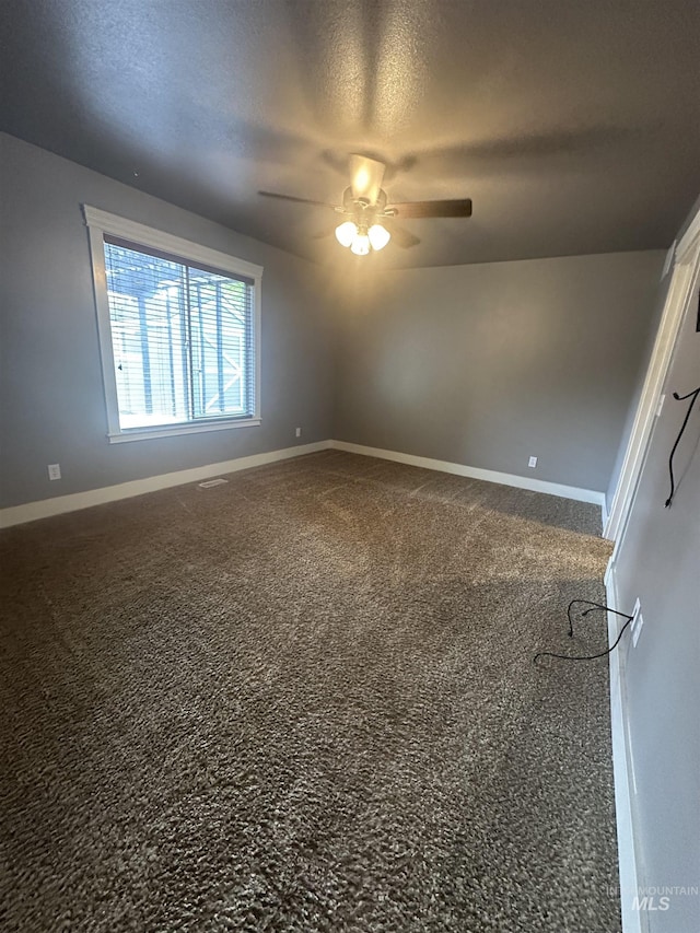 16928 N Chelford Loop, Nampa, ID 83687 - spare room with a ceiling fan, a textured ceiling, and baseboards