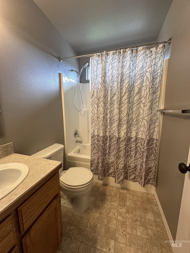 16928 N Chelford Loop, Nampa, ID 83687 - bathroom featuring shower / bath combo, toilet, and vanity