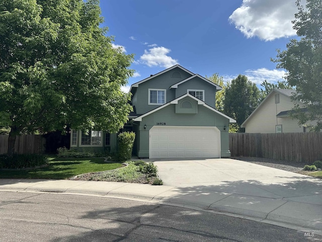 16928 N Chelford Loop, Nampa, ID 83687 - traditional-style home featuring driveway and a garage