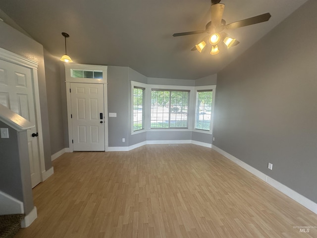 16928 N Chelford Loop, Nampa, ID 83687 - entryway featuring wood finished floors, baseboards, ceiling fan, and lofted ceiling