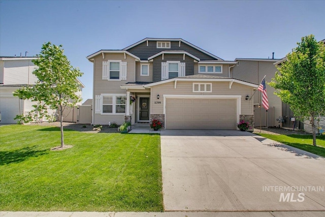 11299 W Taviton St, Nampa, ID 83651 - craftsman-style house with an attached garage, stone siding, and driveway