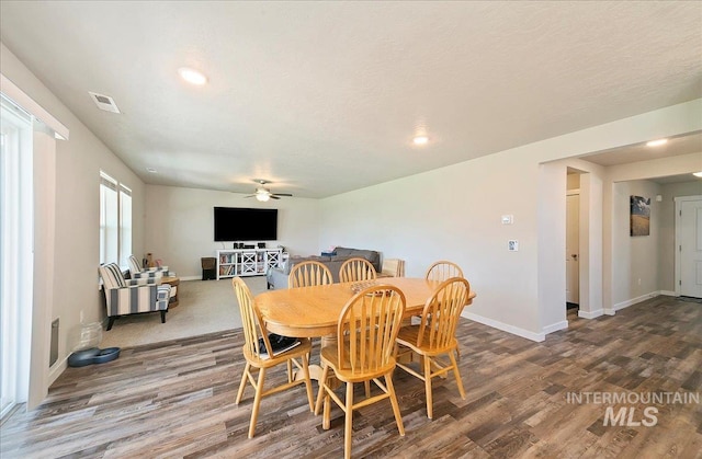 11299 W Taviton St, Nampa, ID 83651 - dining space featuring wood finished floors, a ceiling fan, baseboards, and recessed lighting