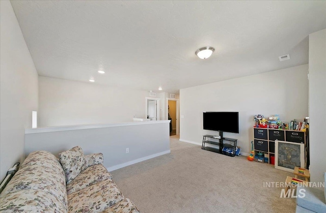 11299 W Taviton St, Nampa, ID 83651 - carpeted living room featuring baseboards