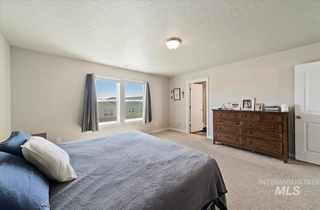 11299 W Taviton St, Nampa, ID 83651 - bedroom featuring light colored carpet and a textured ceiling