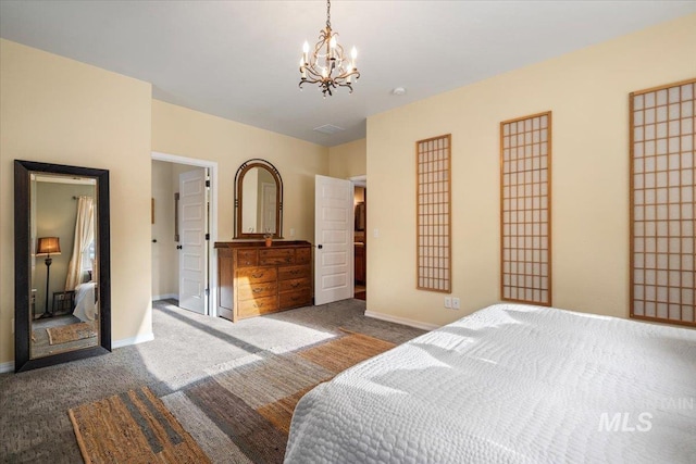 carpeted bedroom featuring a chandelier