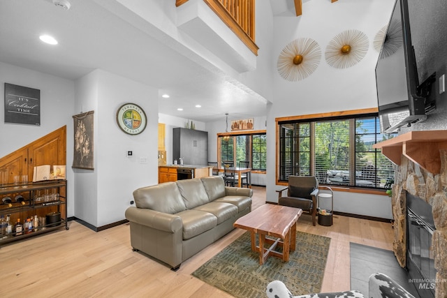 7 Golden Bench Ct, Donnelly, ID 83615 - living area featuring a fireplace, light wood-type flooring, and recessed lighting