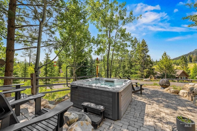 7 Golden Bench Ct, Donnelly, ID 83615 - view of patio with a hot tub