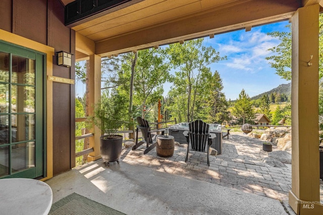 7 Golden Bench Ct, Donnelly, ID 83615 - view of patio featuring a mountain view