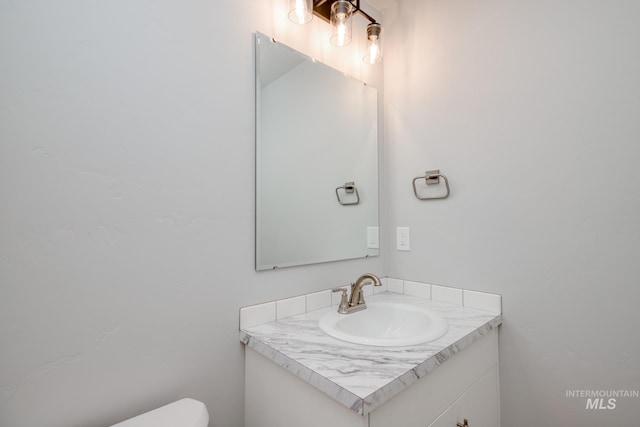 3530 W Littleton Dr, Meridian, ID 83642 - half bathroom featuring vanity and toilet
