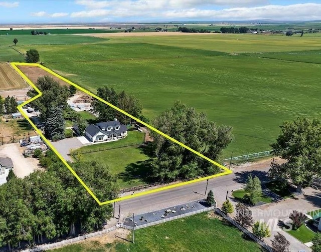 birds eye view of property featuring a rural view