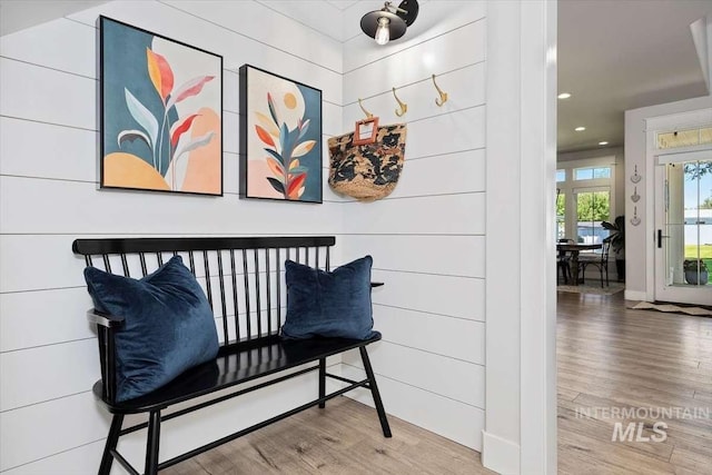 living area with hardwood / wood-style flooring