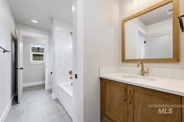 full bathroom with baseboards, visible vents, tile patterned flooring, and vanity