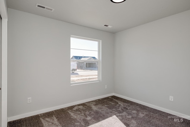 7308 E Marble Springs Dr, Nampa, ID 83687 - spare room featuring visible vents, carpet flooring, and baseboards