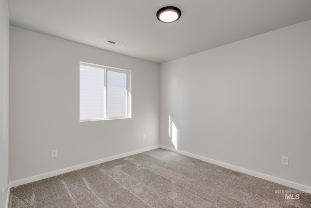 7308 E Marble Springs Dr, Nampa, ID 83687 - spare room featuring carpet and baseboards