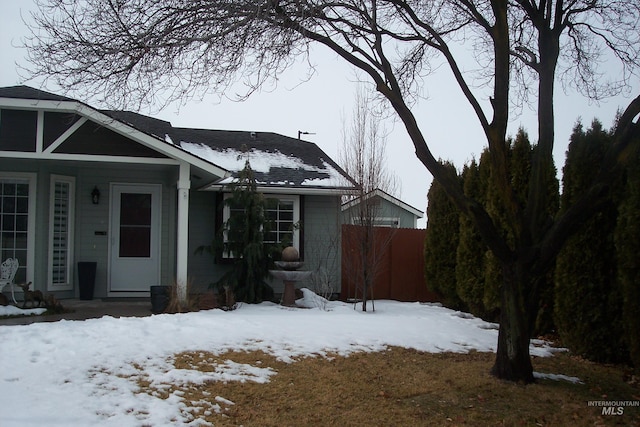 view of front of property with fence