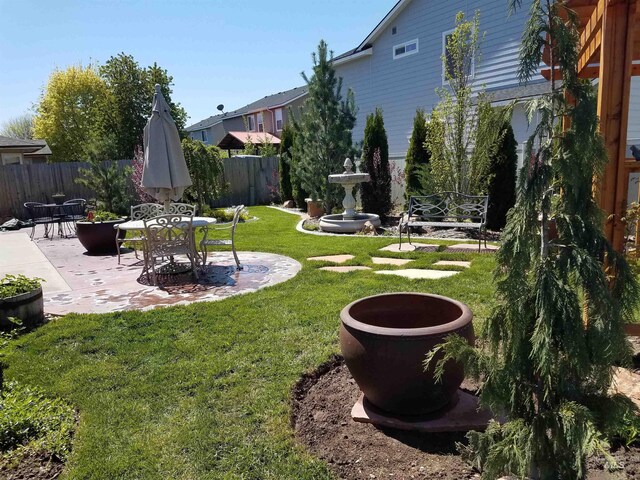 view of yard with a patio area and fence