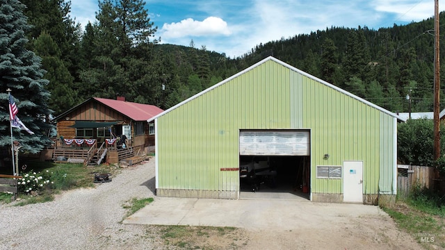 garage featuring a mountain view