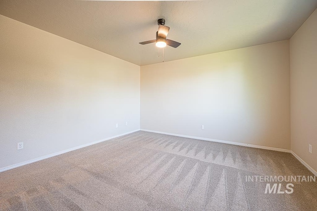 13513 Palm Bch, Caldwell, ID 83607 - unfurnished room featuring carpet flooring and a ceiling fan