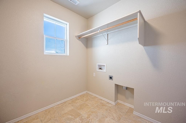 13513 Palm Bch, Caldwell, ID 83607 - washroom featuring hookup for an electric dryer and washer hookup