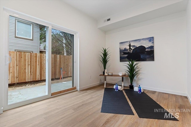 2025 S Makar Ln, Boise, ID 83706 - workout area with wood finished floors and baseboards