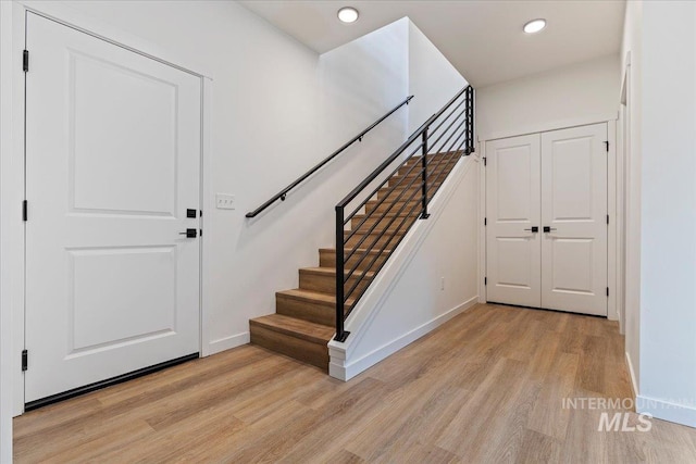 2025 S Makar Ln, Boise, ID 83706 - foyer featuring light wood finished floors, baseboards, recessed lighting, and stairs