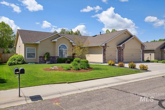 1355 E Hogan St, Eagle, ID 83616 - single story home with a garage, driveway, stone siding, and a shingled roof