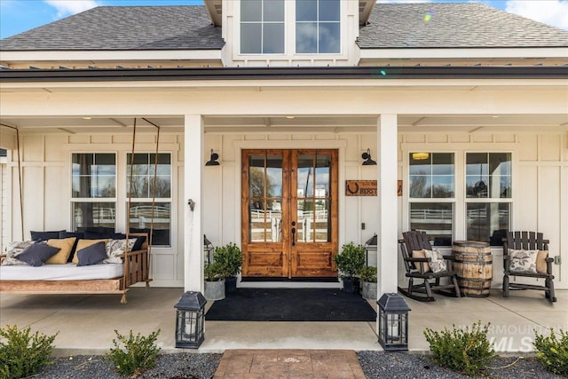10935 Purple Sage Rd, Middleton, ID 83644 - doorway to property with a porch, french doors, board and batten siding, and a shingled roof