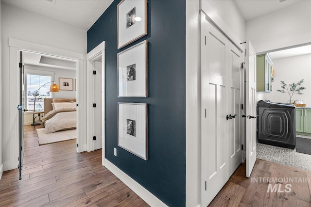 10935 Purple Sage Rd, Middleton, ID 83644 - corridor featuring baseboards and wood finished floors