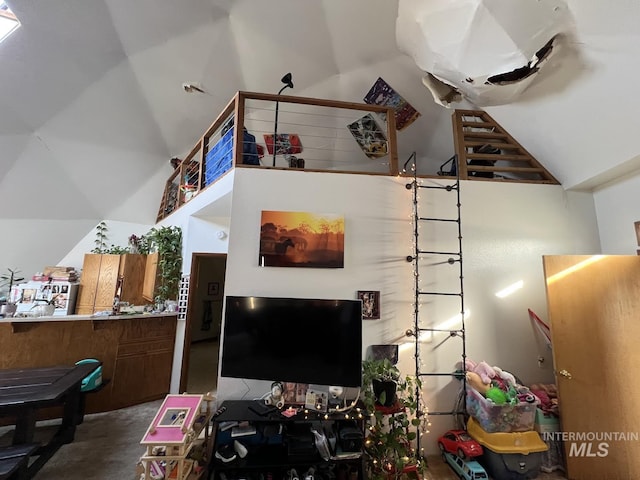 living room with vaulted ceiling