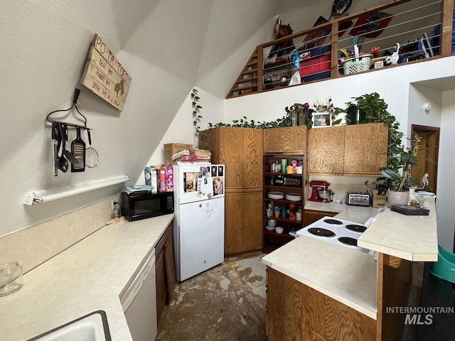 kitchen featuring white appliances, brown cabinetry, and light countertops