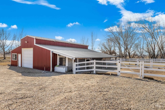 view of outbuilding with a rural view