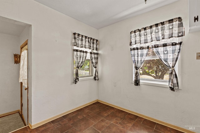 1402 Southside Blvd, Nampa, ID 83686 - unfurnished room featuring healthy amount of natural light and baseboards