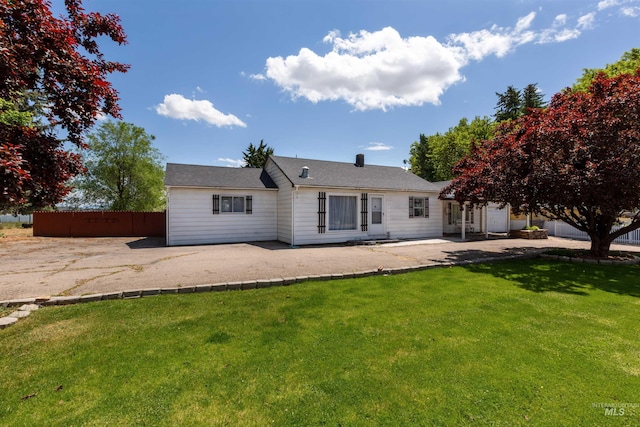 1402 Southside Blvd, Nampa, ID 83686 - rear view of house featuring a patio area